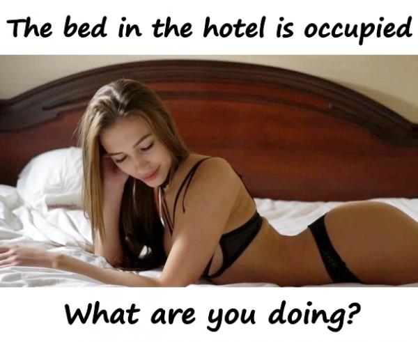 The bed in the hotel is occupied. What are you doing