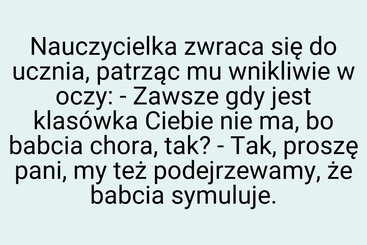 Nauczycielka zwraca się do ucznia, patrząc mu wnikliwie w