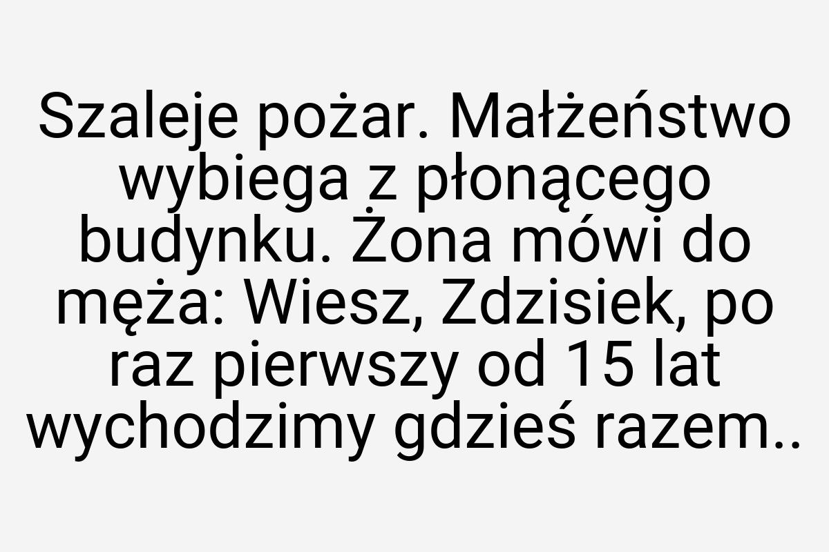 Szaleje pożar. Małżeństwo wybiega z płonącego budynku. Żona