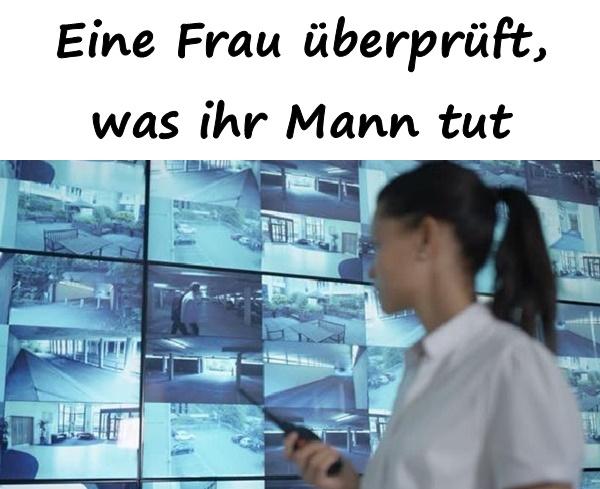 Eine Frau überprüft, was ihr Mann tut