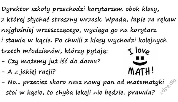 Dyrektor szkoły przechodzi korytarzem obok klasy, z której